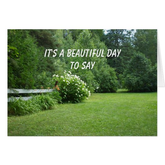 エイプリルフールの日の花と木の芝生のシーン (正面横)