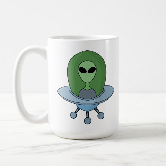 エイリアンは小さな宇宙船で コーヒーマグカップ (左)