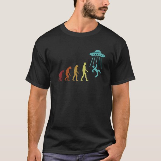 エイリアン エボリューション エイリアン UFO 陰謀 エイリアン Tシャツ (正面)