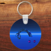 エイリアンVac Uのヘビが双子の球体を同化しようとしている キーホルダー (正面)