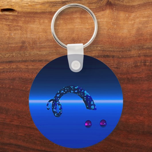 エイリアンVac Uのヘビが双子の球体を同化しようとしている キーホルダー (正面)