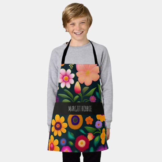 エキゾチックな花のパタカラフルーン エプロン (着用した状態)