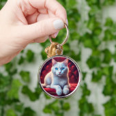 エキゾチックな赤ソファの美しい青い目のアルビノキャット キーホルダー (手)