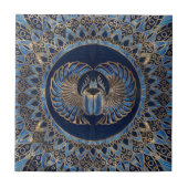 エジプトのオオタマオシコガネのカブトムシの金ゴールドおよび青い大理石 タイル (正面)