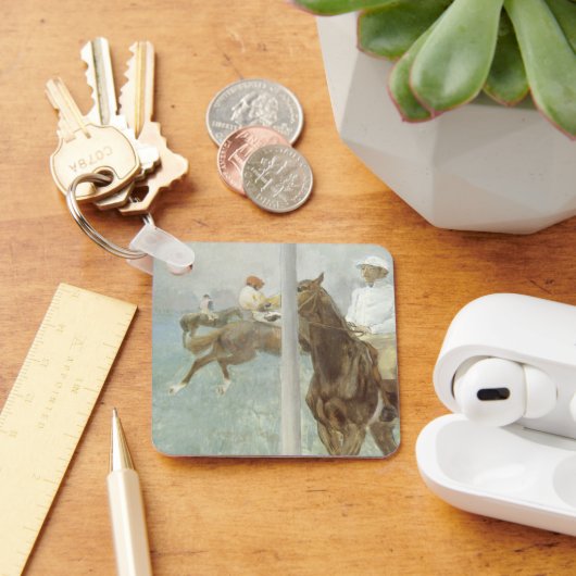 エドガー・デガスによるレース前のジョッキー キーホルダー (デスク)