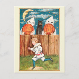 エドワーディアン時代の少年がハロウィンの幽霊から走って逃げる ポストカード