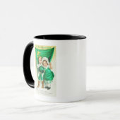 エリンに旗を掲げた夫婦を思い出させる マグカップ (正面左)