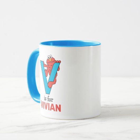 エルモ文字 | V青 マグカップ (正面左)