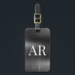 エレガントでスタイリッシュなブラックメタル2文字イニシャル ラゲッジタグ<br><div class="desc">女性的でモダンなエレガントなブラックメタル2文字イニシャル カスタムパーソナライズ 旅行鞄タグ。 このデザインは、2つのイニシャルを表すフォントと、黒いメタリックなホイル調の背景に裏面の住所情報を特徴としています。 これらは簡単にカスタマイズできます。 結婚式、ブライズシャワー、スウィート16の誕生日、卒業式、エレガンススタイルが好きな人へのスタイリッシュな贈り物。</div>