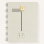 エレガントなクリーミーゴールドの輝くモノグラムスパイラル ノートブック (正面)