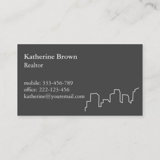 エレガントなスカイラインの輪郭の不動産仲介業者の名刺 名刺 (裏面)