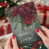 エレガントなスパークリング赤いバラと松のクリスマス シーズンカード