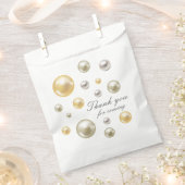 エレガントなパールとプロセッコのブライダルシャワー フェイバーバッグ (クリップ留めされた状態)