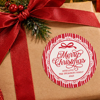 エレガントなメリークリスマスの筆記体 赤いリボンのストライプ ラウンドシール