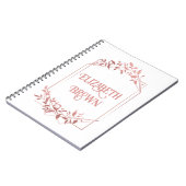 エレガントなローズゴールドのフレームが光を放つ ノートブック (左側)