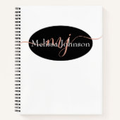 エレガントなローズゴールドの文字がブラックの上に   ノートブック (正面)