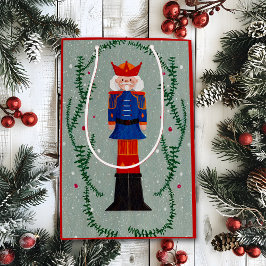 エレガントな伝統的な赤いメリークリスマスナッツクラッカー ミディアムペーパーバッグ