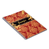 エレガントな金めっきされた赤および金ゴールドのダマスク織 ノートブック (右側)