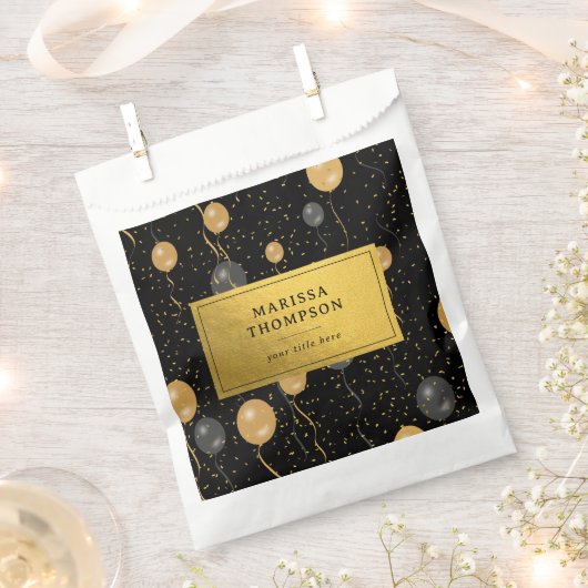 エレガント黒と金ゴールドのバルーン フェイバーバッグ (クリップ留めされた状態)