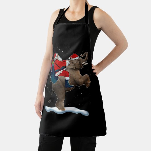 エレファントクリスマスツリーライトハットクリスマスサンタリジン エプロン (インサイチュ)