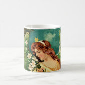 エンジェルがフローラ枝を持つ コーヒーマグカップ (中央)