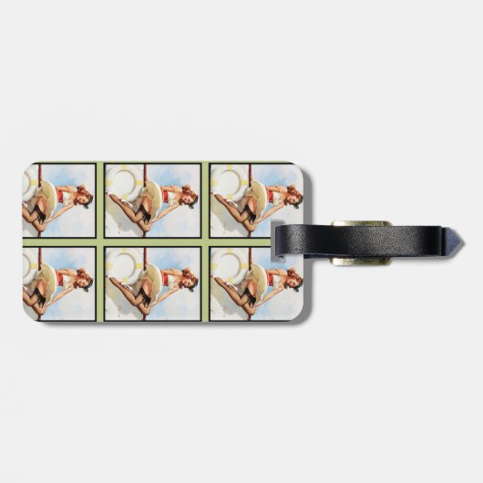 エンボスのモノグラムが付いているヴィンテージの航海のなピン ラゲッジタグ (裏面横)