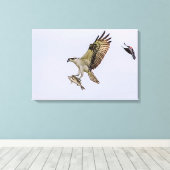 オスプレイは赤い翼を持つ黒鳥に追いかけられる キャンバスプリント (インサイチュ (ウッドフロア))