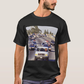 オバマを追いかける警官の車のトランプとJd Vance Tシャツ
