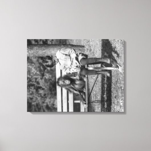 オランウータンと男の子（国立動物園の写真） キャンバスプリント (正面)