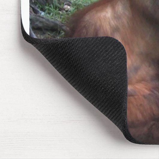 オランウータンは水ではねかけます マウスパッド (コーナー)