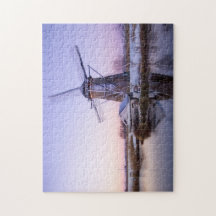 オランダの冬のパズルの日の出の間の風車