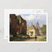 オランダの町にある赤レンガの教会前の人物像 ポストカード (正面/裏面)