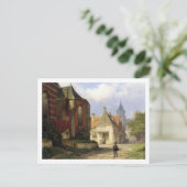 オランダの町にある赤レンガの教会前の人物像 ポストカード (スタンド正面)