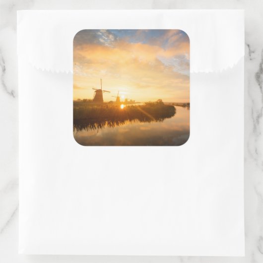 オランダの風車と川の上の日の出 スクエアシール (バッグ)