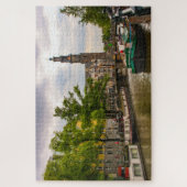 オランダ、アムステルダムの運河と古い教会 ジグソーパズル (縦)