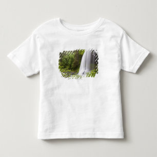 オレゴンのぼやけられた滝および森林眺め トドラーTシャツ