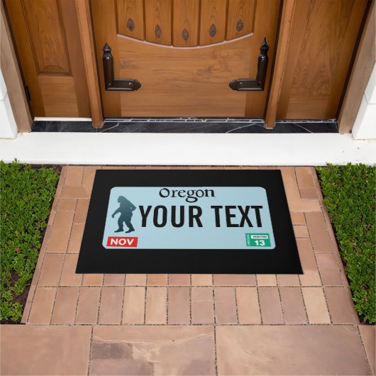 オレゴンサスカッチライセンスプレート ドアマット (室外)