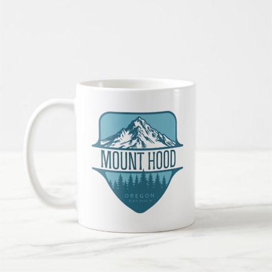 オレゴン州マウントフッドの山の紋章デザイン コーヒーマグカップ (左)