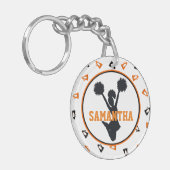 オレンジおよび黒いメガホンのチアリーダーの写真 キーホルダー (正面左)