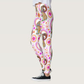 オレンジきらめく色とピンク色のバニー レギンス (左)