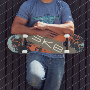 オレンジつる植物と文字SK8 スケートボード