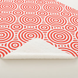 オレンジと白の入れ子になった円形パターン シェルパブランケット