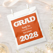 オレンジと白の卒業党の好意バッグ フェイバーバッグ (クリップ留めされた状態)