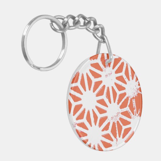 オレンジと白の幾何学的パターン キーホルダー (正面左)