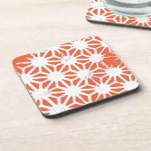 オレンジと白の幾何学的パターン コースター (左側)