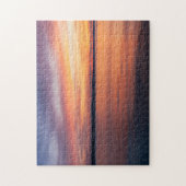 オレンジと紫の夕焼けの雲が湖の水面に映る ジグソーパズル (縦)