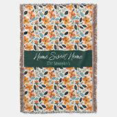 オレンジと青の葉と花パーソナライズされた スローブランケット (正面縦)