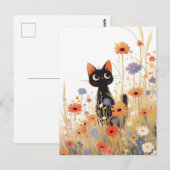 オレンジと青の野花の草原の黒猫 ポストカード (正面/裏面)