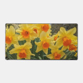 オレンジと黄色の二色ダッフォジルのフローラ デスクマット (正面)