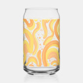 オレンジと黄色の渦巻き形にドットが付いている ガラス缶 (右)